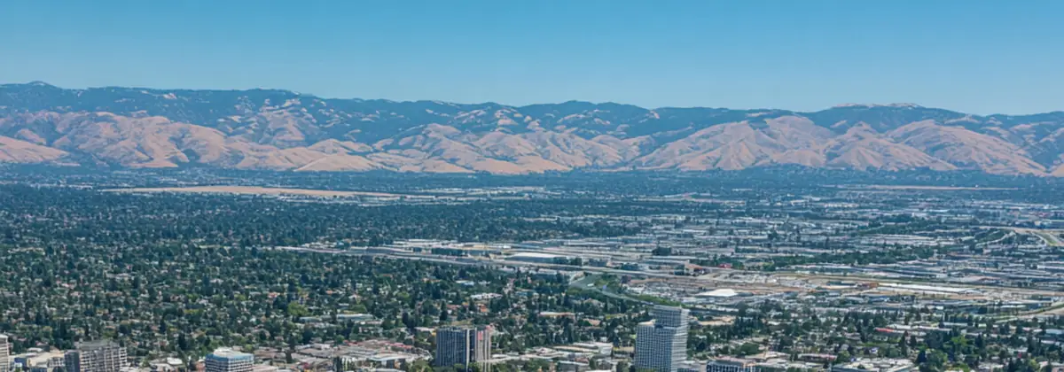 Aerial daytime view of San Jose downtown, Silicon Valley, and the Santa Clara Valley with Diablo Range